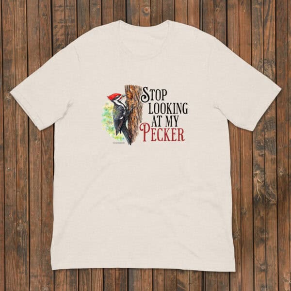 Colorful woodpecker on tree design with humorous text "Stop Looking at My Pecker" for birdwatching fans.