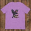 Purple T-shirt with a black bird playing drums for Squawk Riot.