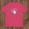 Cute pink T-shirt with bird holding a love letter, perfect for birdwear lovers and romantic gifting.